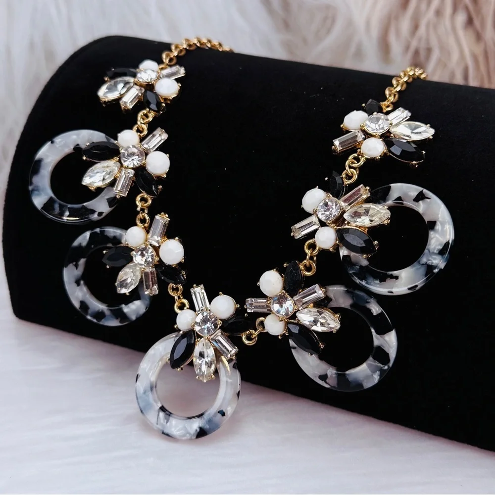 Goldtone, white and black bling statement, necklace